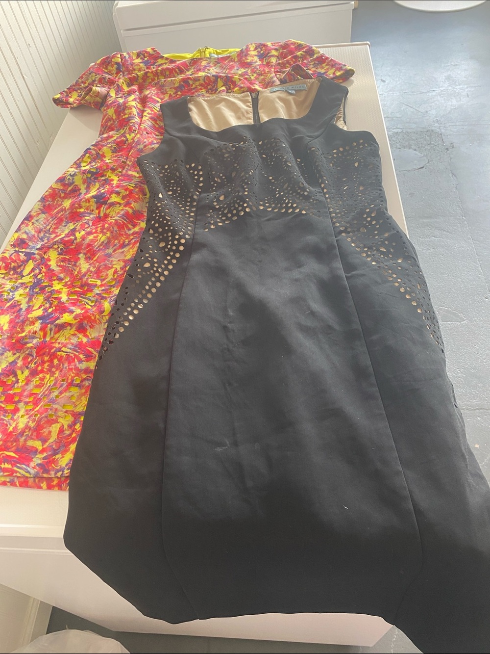 2 ANTONIO MELANI Laser-Cut Dresses. Both size 0. Great condition. Will separate.